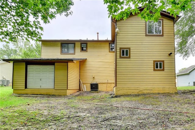 back of property with central air condition unit