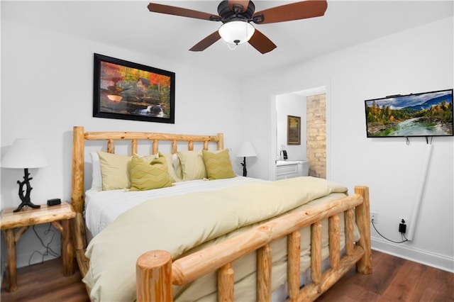 bedroom featuring ceiling fan, dark hardwood / wood-style floors, and ensuite bathroom