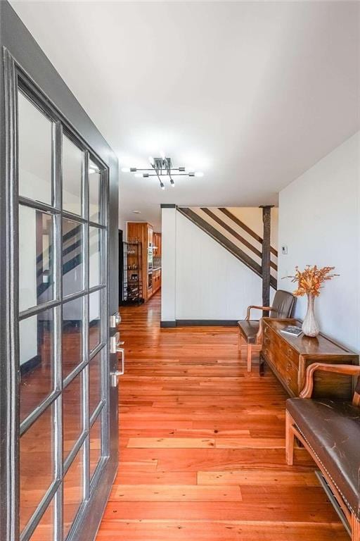 sitting room featuring light wood finished floors