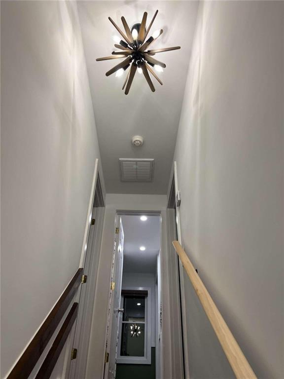 hallway with visible vents