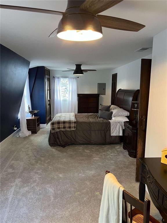 bedroom featuring carpet flooring, visible vents, and ceiling fan