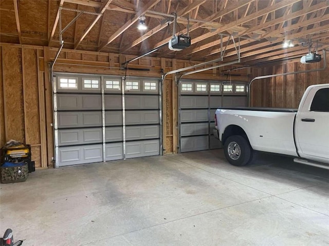 garage featuring a garage door opener