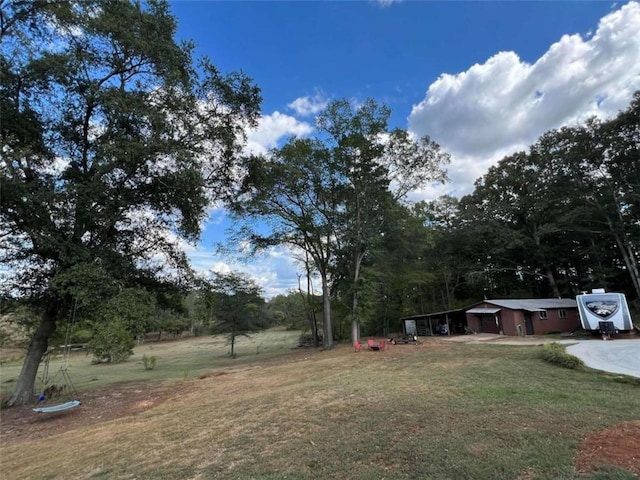 view of yard with a garage