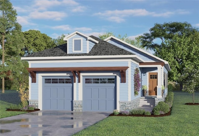 view of front of home featuring a garage and a front lawn