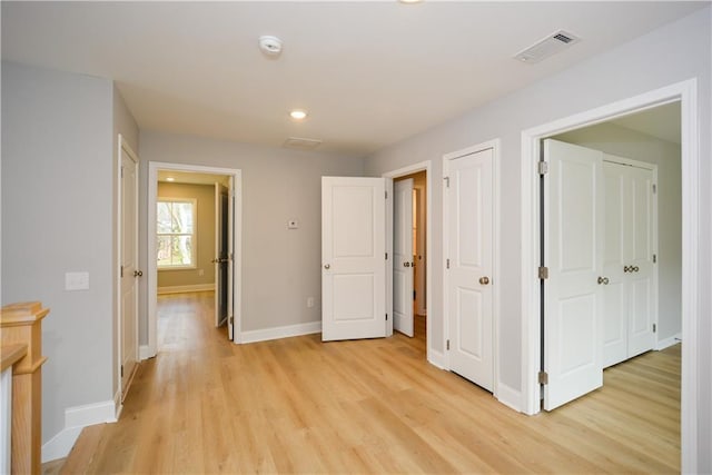 hallway featuring light hardwood / wood-style flooring