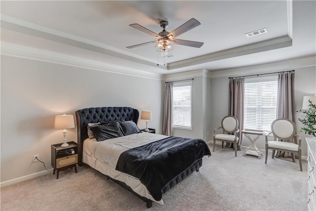 6410 Crosscreek Ln, Flowery Branch, GA 30542 - bedroom with a raised ceiling, crown molding, light carpet, and a ceiling fan