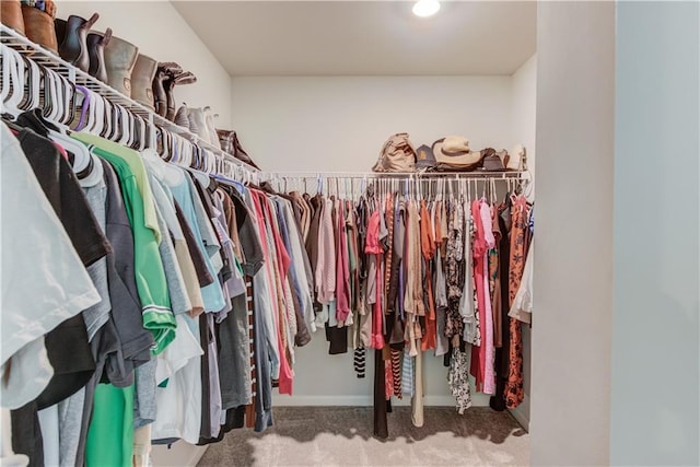 6410 Crosscreek Ln, Flowery Branch, GA 30542 - walk in closet featuring carpet floors