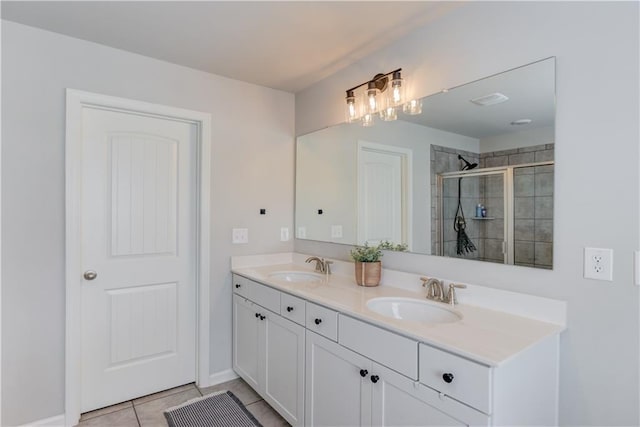 6410 Crosscreek Ln, Flowery Branch, GA 30542 - bathroom with double vanity, a tile shower, and tile patterned floors