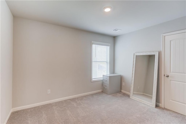 6410 Crosscreek Ln, Flowery Branch, GA 30542 - unfurnished bedroom featuring light colored carpet