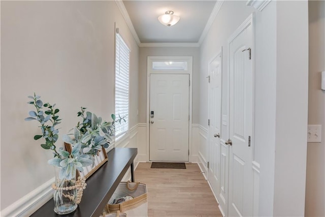 6410 Crosscreek Ln, Flowery Branch, GA 30542 - doorway featuring light wood-style floors and crown molding