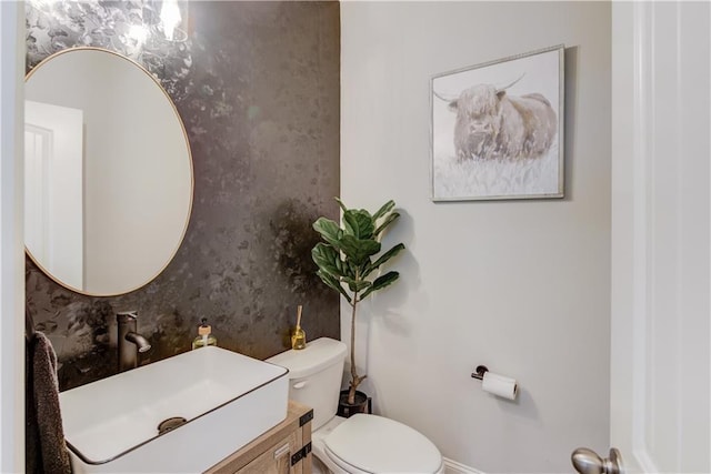 6410 Crosscreek Ln, Flowery Branch, GA 30542 - bathroom featuring vanity and toilet