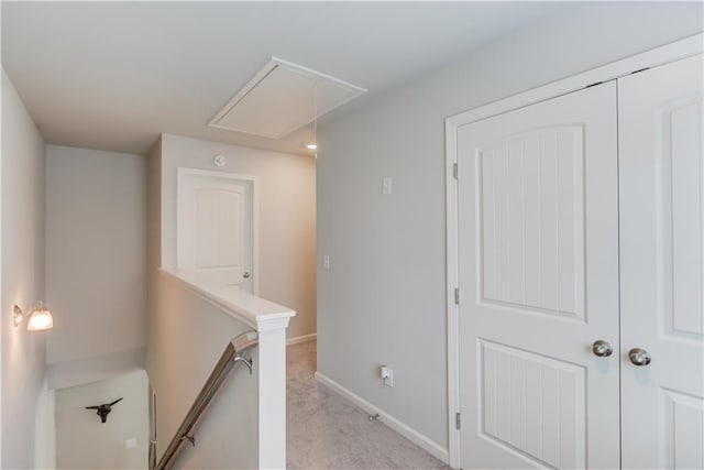 6410 Crosscreek Ln, Flowery Branch, GA 30542 - corridor with attic access, an upstairs landing, and light colored carpet