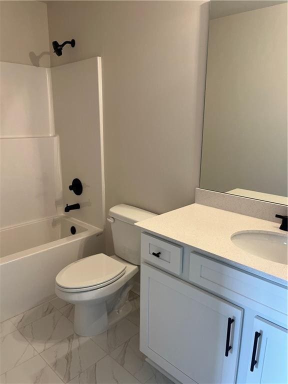 full bath featuring shower / bathtub combination, toilet, marble finish floor, and vanity