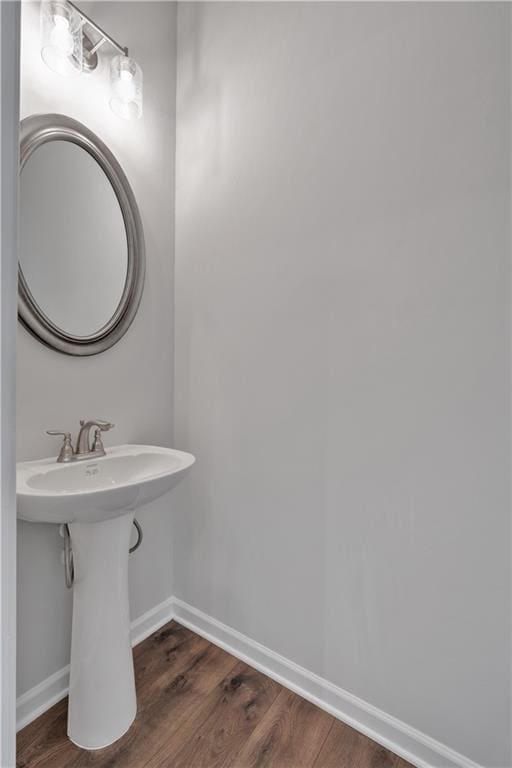 16 Grove Pointe Way SE, Cartersville, GA 30120 - bathroom with wood finished floors and baseboards
