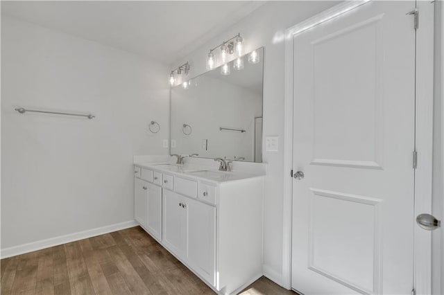 16 Grove Pointe Way SE, Cartersville, GA 30120 - full bath featuring wood finished floors, double vanity, and baseboards