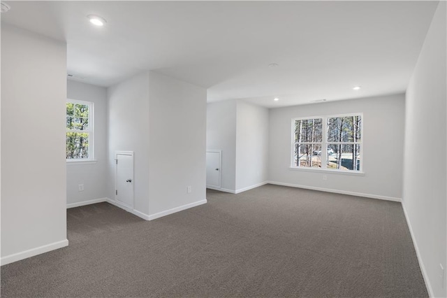 16 Grove Pointe Way SE, Cartersville, GA 30120 - unfurnished room featuring dark carpet, baseboards, and recessed lighting