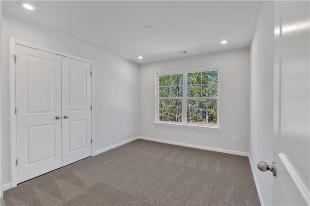 16 Grove Pointe Way SE, Cartersville, GA 30120 - unfurnished bedroom featuring carpet, baseboards, recessed lighting, and a closet