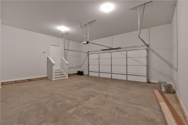16 Grove Pointe Way SE, Cartersville, GA 30120 - garage featuring a garage door opener and baseboards