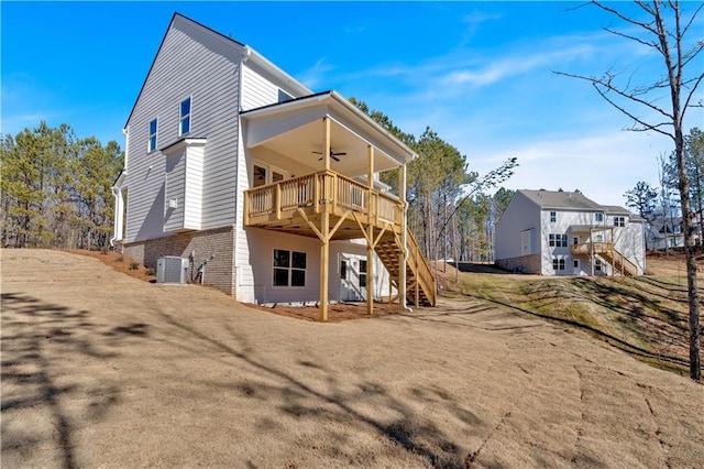 16 Grove Pointe Way SE, Cartersville, GA 30120 - back of property featuring stairs, ceiling fan, cooling unit, a deck, and brick siding