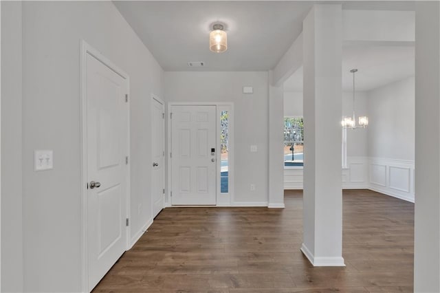 16 Grove Pointe Way SE, Cartersville, GA 30120 - foyer entrance with dark wood-style floors and a chandelier
