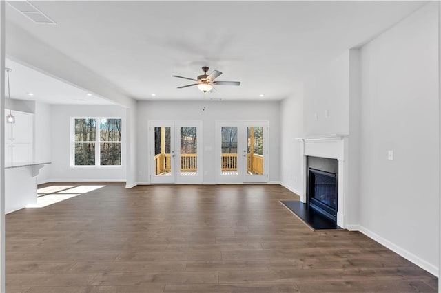 16 Grove Pointe Way SE, Cartersville, GA 30120 - unfurnished living room featuring a glass covered fireplace, ceiling fan, dark wood-type flooring, and recessed lighting