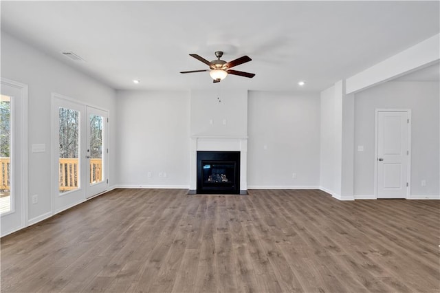 16 Grove Pointe Way SE, Cartersville, GA 30120 - unfurnished living room with a ceiling fan, wood finished floors, recessed lighting, a fireplace with flush hearth, and baseboards