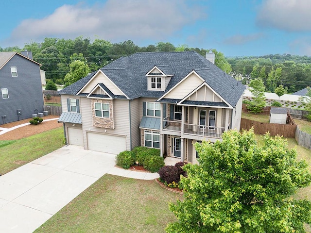 3631 Guinevere Trce, Douglasville, GA 30135 - craftsman-style home featuring a garage, a balcony, driveway, a standing seam roof, and a chimney