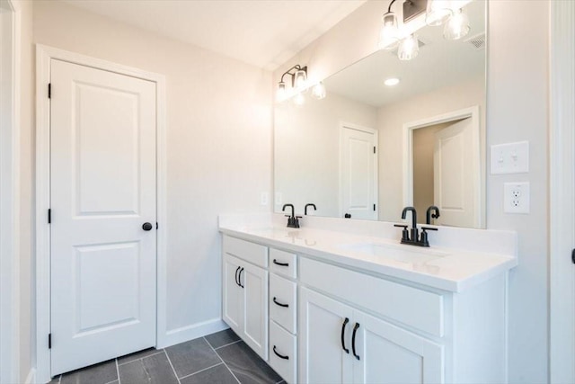 bathroom with vanity and tile patterned floors