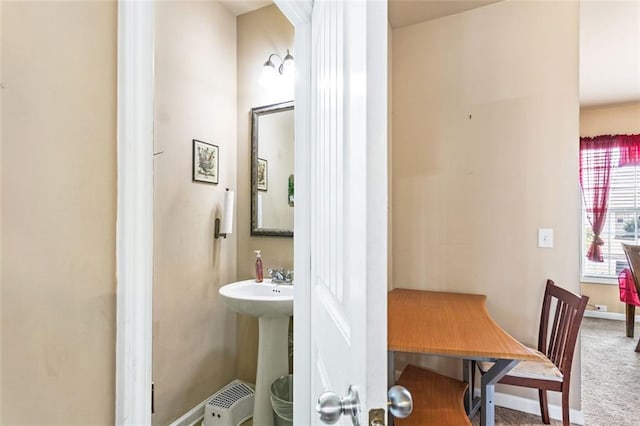 bathroom with baseboards