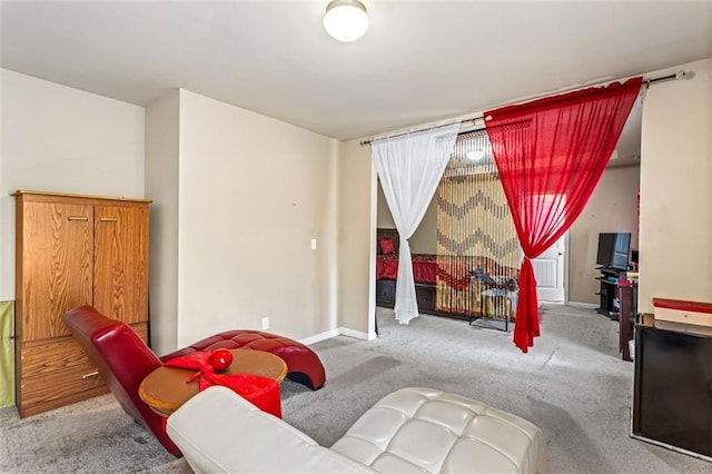 game room featuring baseboards and carpet flooring