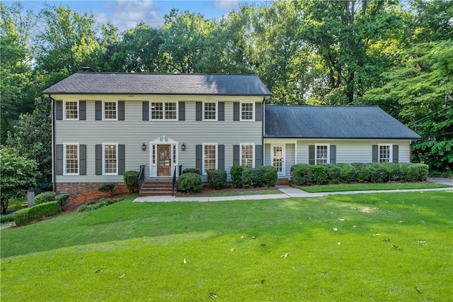 5143 Meadowlake Ln, Dunwoody, GA 30338 - colonial inspired home with a front lawn