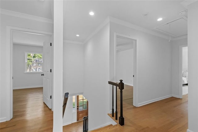 5143 Meadowlake Ln, Dunwoody, GA 30338 - hallway with an upstairs landing, attic access, wood finished floors, crown molding, and recessed lighting
