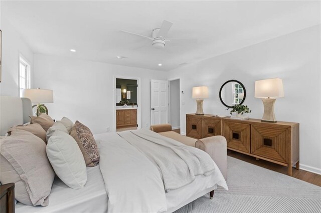 5143 Meadowlake Ln, Dunwoody, GA 30338 - bedroom with wood finished floors, recessed lighting, baseboards, ensuite bathroom, and a ceiling fan