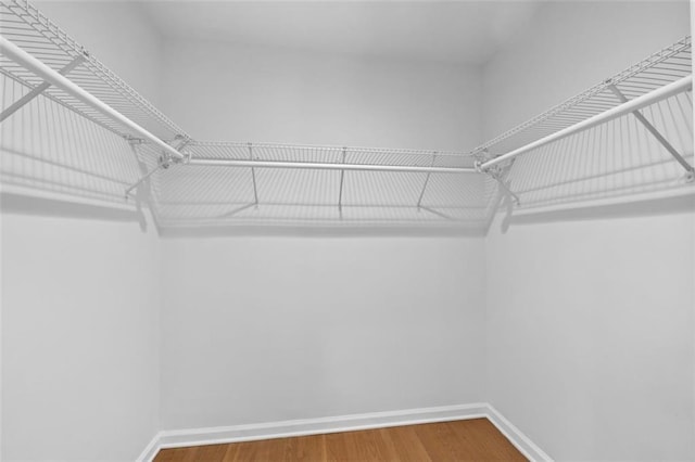 5143 Meadowlake Ln, Dunwoody, GA 30338 - spacious closet featuring wood finished floors