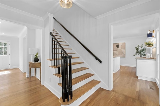 5143 Meadowlake Ln, Dunwoody, GA 30338 - staircase with wood finished floors, crown molding, baseboards, and recessed lighting