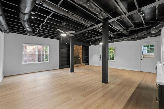5143 Meadowlake Ln, Dunwoody, GA 30338 - basement with baseboards and light wood-style flooring