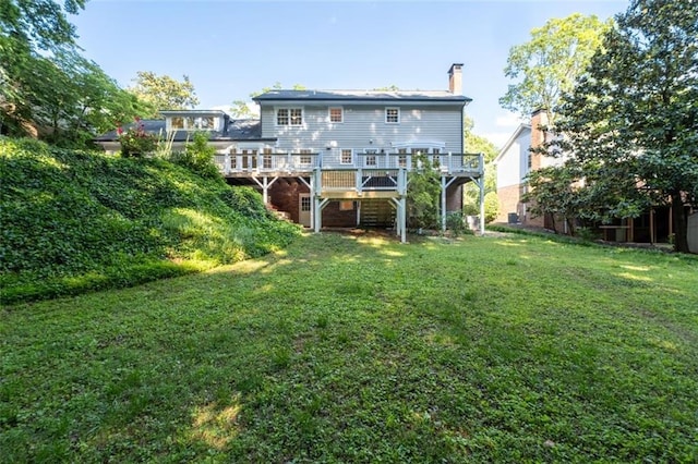 5143 Meadowlake Ln, Dunwoody, GA 30338 - rear view of property featuring a wooden deck, a yard, and a chimney