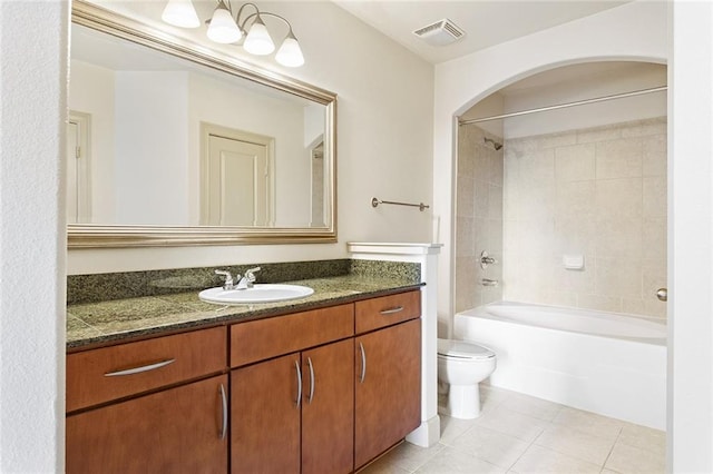 3445 Stratford Rd NE Unit 1605, Atlanta, GA 30326 - bathroom featuring vanity, toilet, tile patterned floors, and tub / shower combination