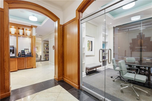 bathroom featuring tile patterned flooring and crown molding