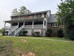 view of front of home with a front lawn