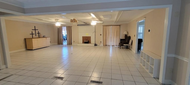 interior space featuring ceiling fan and ornamental molding