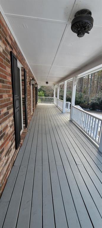 wooden deck featuring covered porch