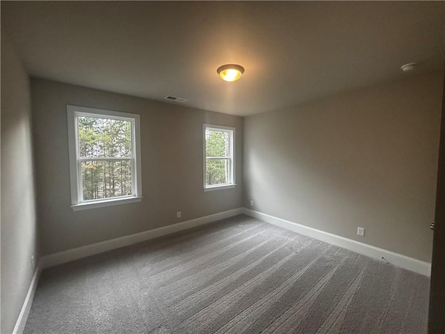 view of carpeted spare room