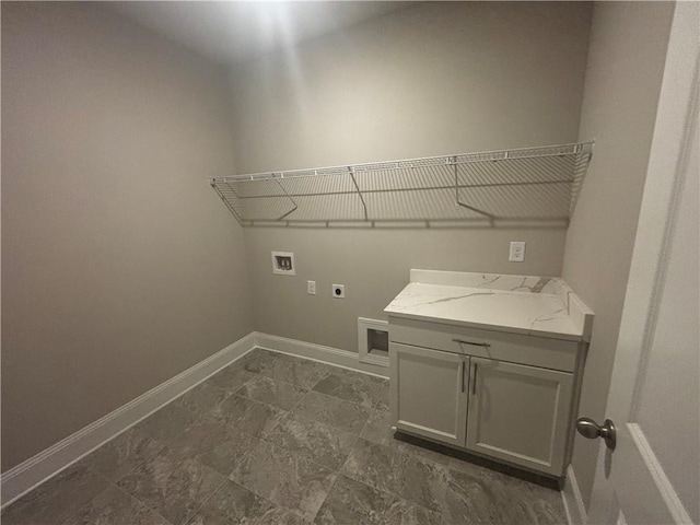 laundry room with hookup for an electric dryer, washer hookup, and sink