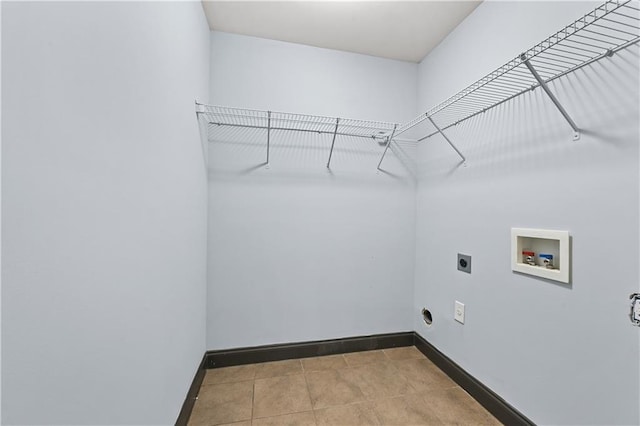 laundry room with washer hookup, laundry area, electric dryer hookup, and baseboards