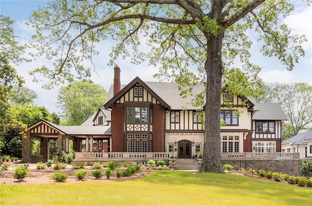 1585 S Ponce De Leon Ave NE Unit 20, Atlanta, GA 30307 - back of house with a chimney and a yard