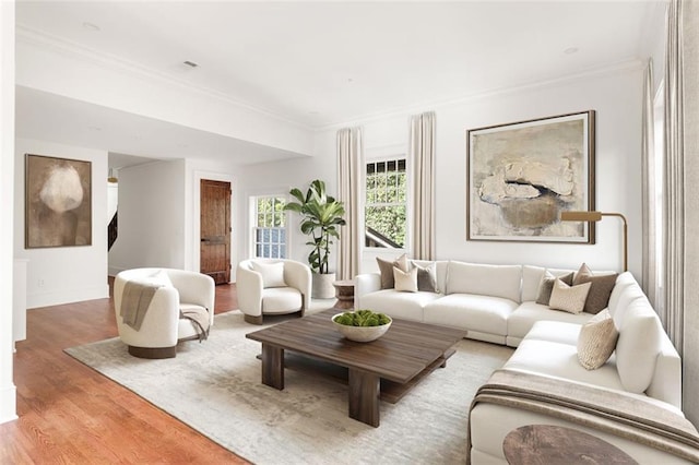 1585 S Ponce De Leon Ave NE Unit 20, Atlanta, GA 30307 - living area featuring light wood finished floors, crown molding, and baseboards