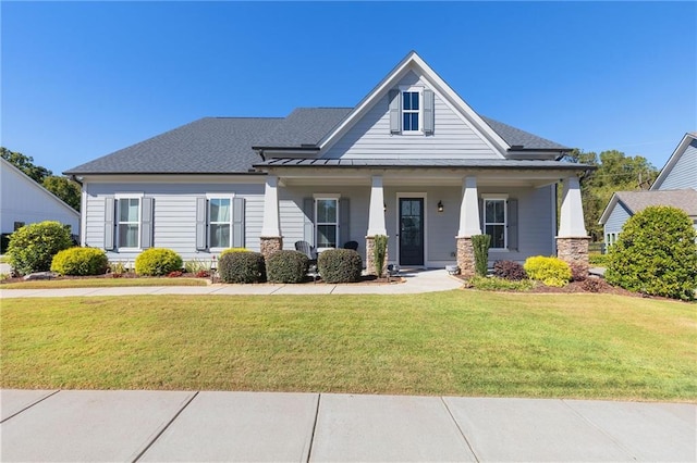 view of front of home with a front yard