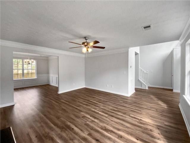 unfurnished living room with dark wood-type flooring, crown molding, and ceiling fan with notable chandelier