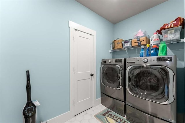 laundry room with laundry area and washing machine and dryer